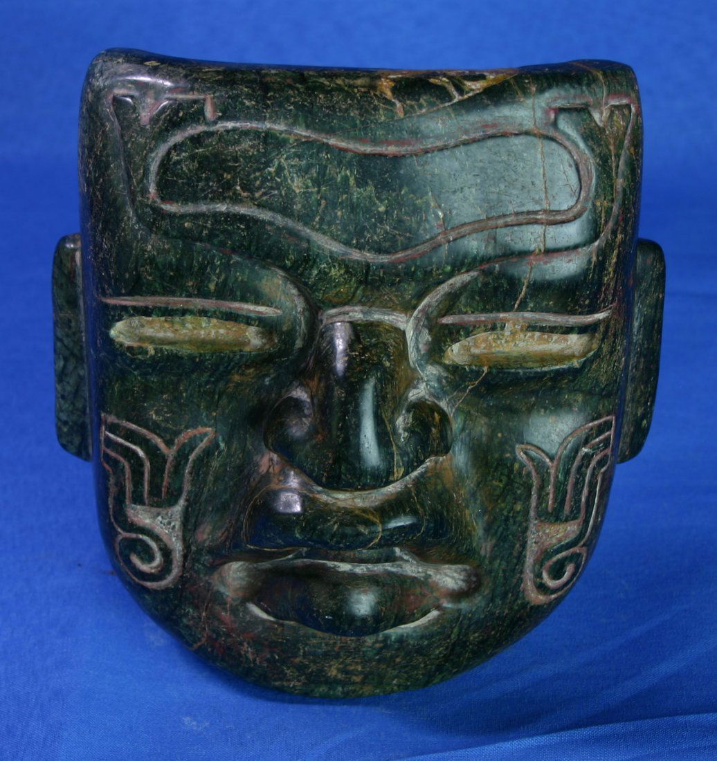 6 3/8"x5 3/4" Olmec-Style Mask - Decorative: Well made in jadeite example after the classic Olmec Style with good polish. Decorative Only.