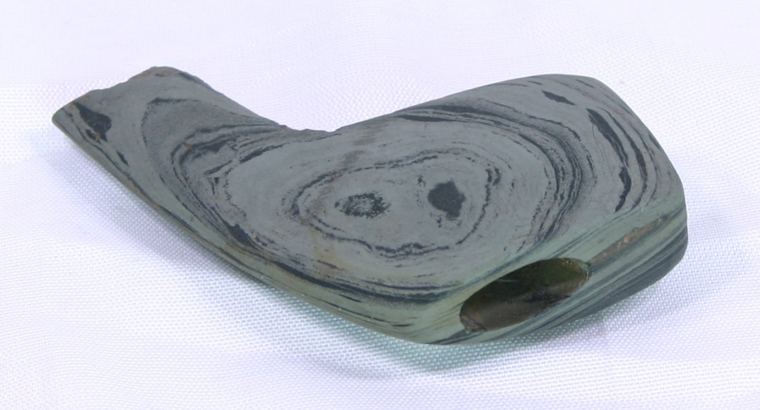 3 1/2" Geniculate Bannerstone - Davis COA: Nicely made example in green banded slate from Ohio. Ex - Dr. L.E. Hicks Collection, pictured in the Shipley Catalog #1018 and featured on the back cover of Indian Bannerstones by Lar Hothem. Nice!