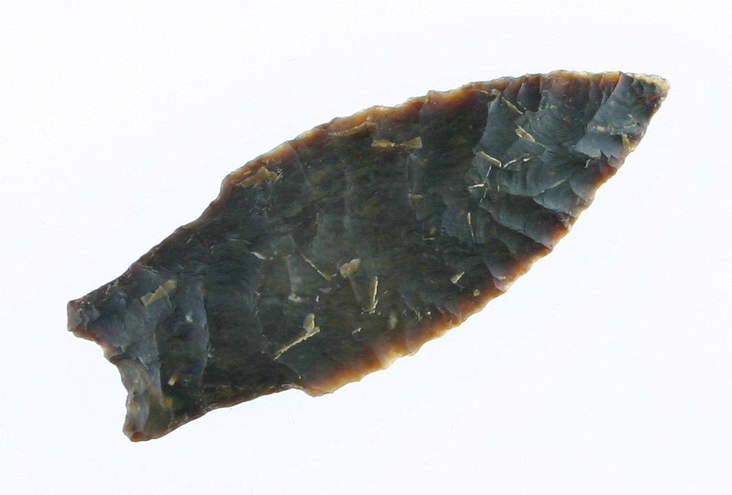 2 9/16" Cody Complex: Stunning obliquely flaked example in Knife River Flint found by Karl Schug in Dodge Co., Wisconsin. Very nice. Translucent margins.