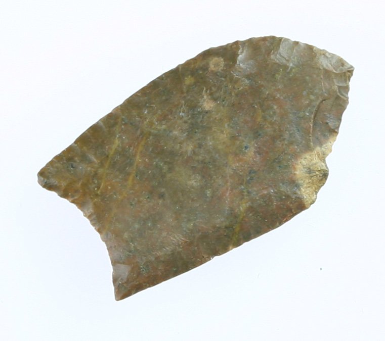 1 7/16" Folsom - STERMER COA: Dendritic chert example found in New Mexico in the 1960's. Features a Stermer COA. Rare Lindenmeier form with fine edgework and fluted to the tip.