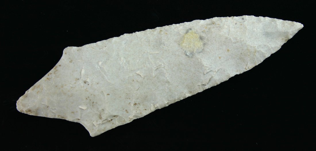 4 15/16" Table Rock Pointed Stem: Excellent example in a tan fossil chert from Oklahoma. Nice mineralization. Ex - Suter Collection.