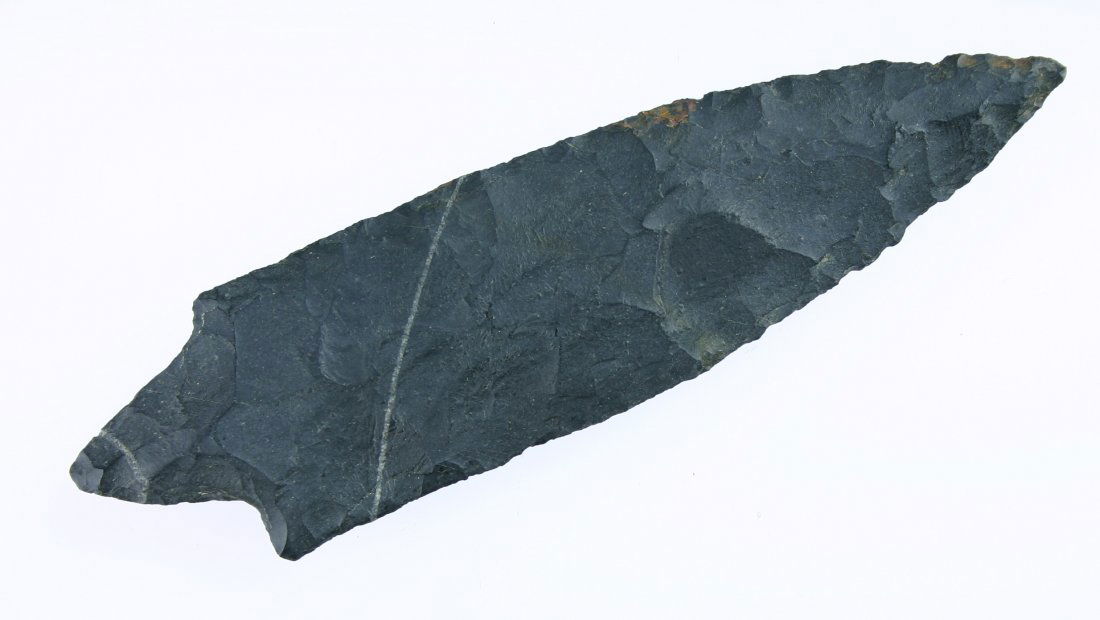 5 1/4" Table Rock Pointed Stem - Perino COA: Nicely constructed piece made from black Battiest Chert and found by Charles Yates in Pope Co., Arkansas while Turkey Hunting. Ex - Ricky Steed, C.O. Scarbrough, Bill German Collections. Good Perino C