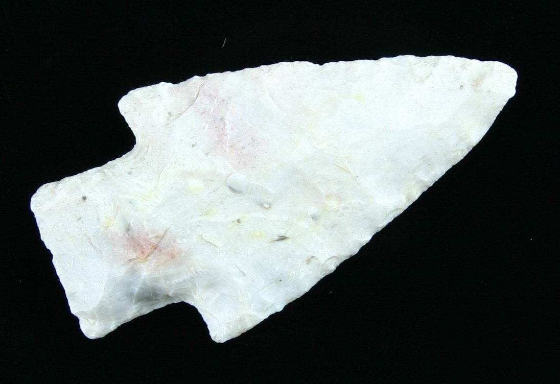 2 1/16" Hopewell: White fossiliferous Burlington chert example from MO/IL. Nice with great symmetry. Ex - Gilbert Collection.