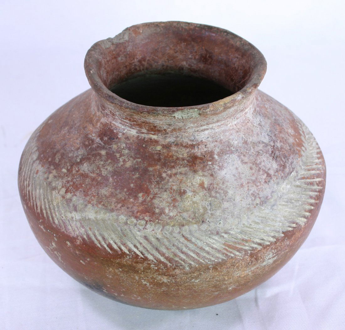 5"x 6 3/8" Jalisco PreColumbian Redware Pot: Nicely made SOLID example with no restoration. Decent glaze and mineralization. Mexico, circa 100BC-250AD. Etched relief around circumference.