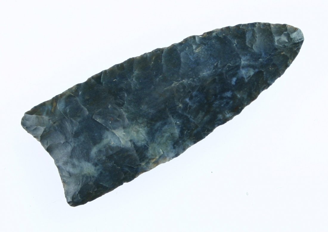 2 5/8" Clovis - Davis G-9 COA: Extra pretty example made of well patinated glossy dark blue/black mottled Fort Payne Chert. Exceptional flaking with a nice 'double flute' on one side. Found in Kentucky. Davis G-9 COA.