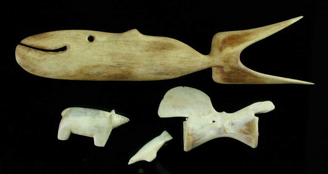 Mini-Collection of Alaskan Bone and Ivory: Large carving of a whale, a Polar Bear Fetish, Unusual vertebra, and a small seal carved from Ivory with a safety-pin back. U.S. Buyers only, no shipments to California.