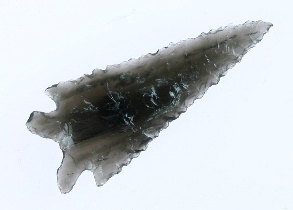 2 1/16" Elko Eared - Stermer COA: Great symmetry. Very thin. Highly translucent Obsidian. Lake Co., Oregon. Ex- Tony Hardie. Consignor reports this piece has a Stermer COA #3182 which was lost but could be replaced.