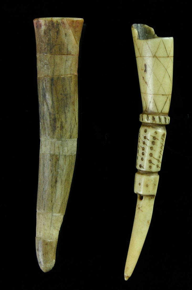 Pair of Eskimo Snuff Tubes: Nice set of Bone tubes from Alaska formerly of the Bill Carter Estate Collection. Nice engraving on one example, remnant of paint on the other. Both are approx 3 1/2" long.