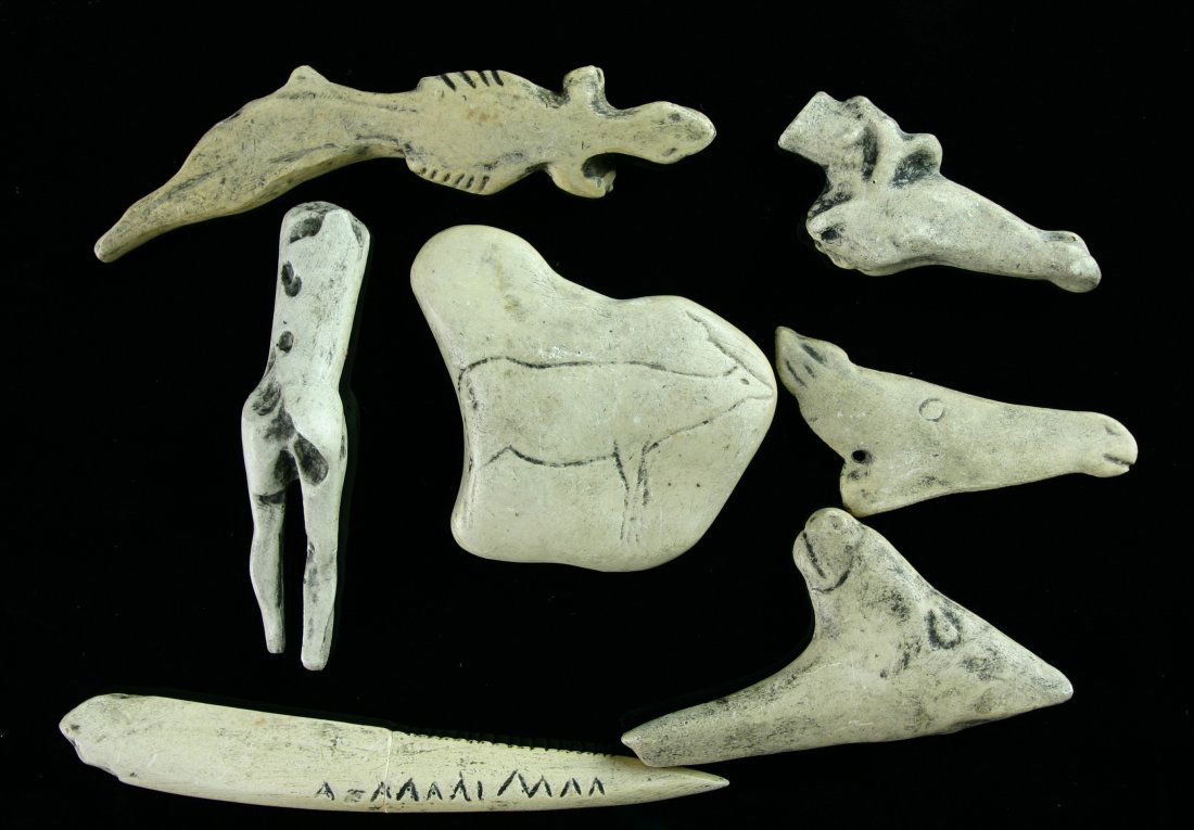 7pc European Paleolithic Carving Cast Collection -: Excellent assortment of hydrastone/resin casts of Upper Paleolithic carvings from Europe - great for study or for display. Human, Stag, Horse, and other animals featured along with a incised awl. Agai