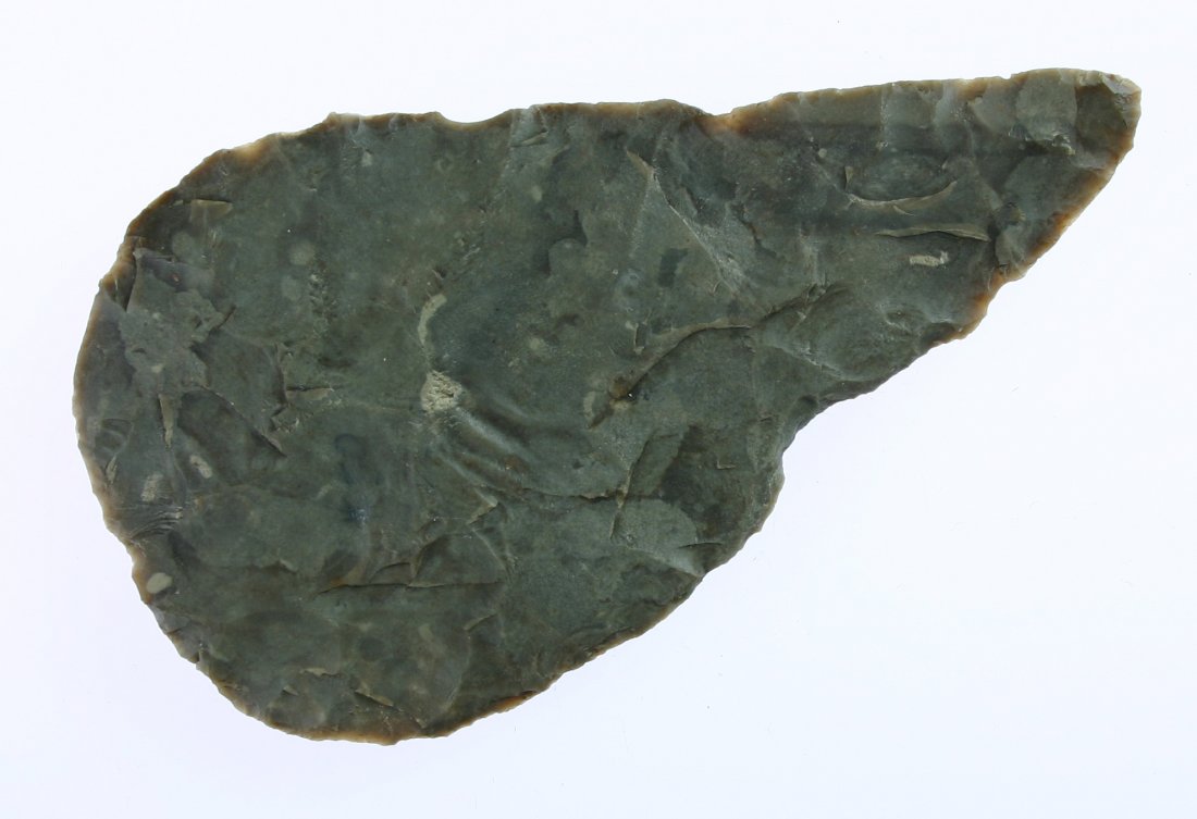 5 3/16" Covington Blade: Texas example formerly of the Charlie Shewey Collection. Edwards Plateau Chert. Very thin with nice mottling.