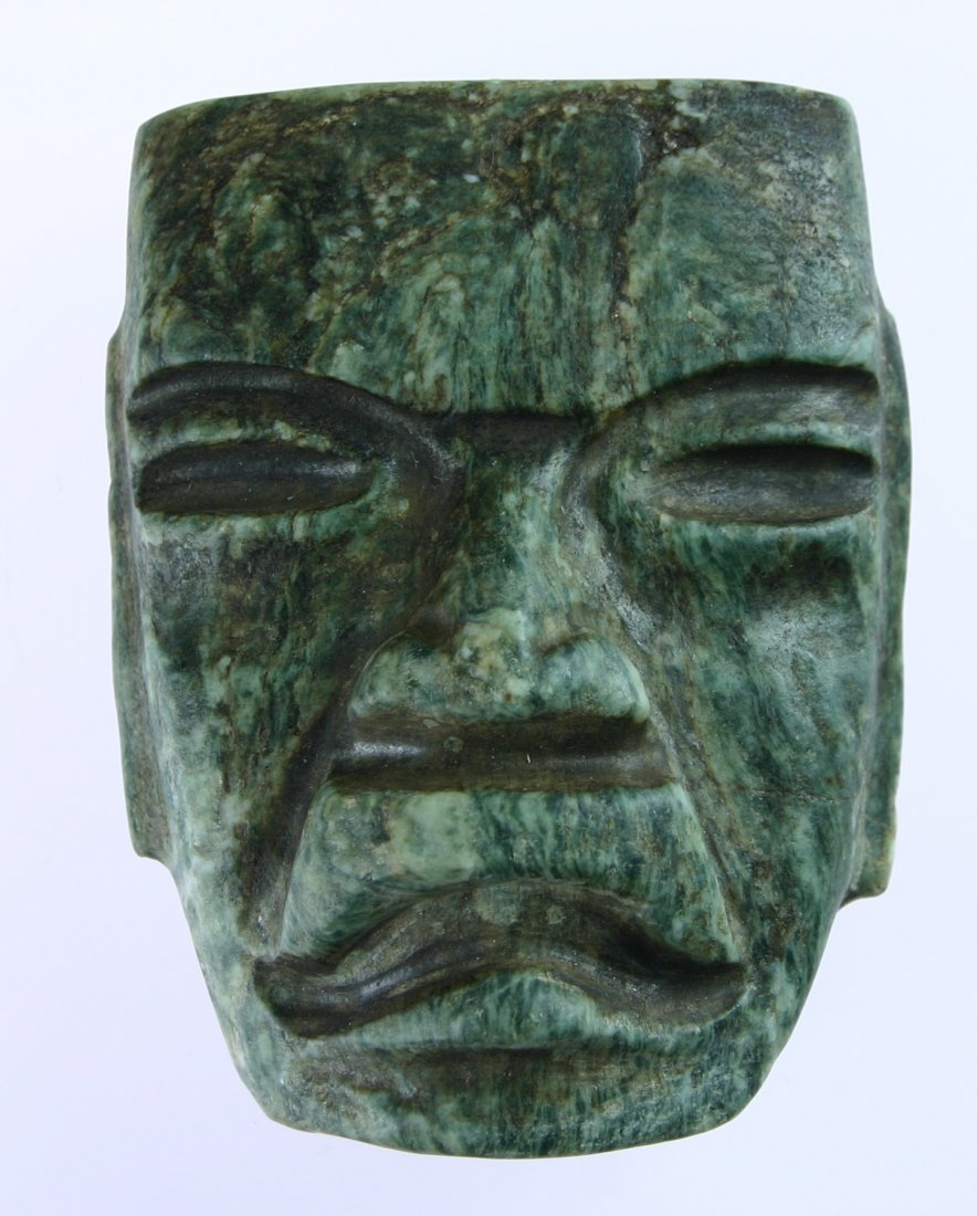 Small Serpentine PreColumbian Mask: Excellent example. Extra pretty speckled green serpentine. Labeled as found near Vera Cruz (City) Mexico. Ex- Dr. Cosby Collection (grandfathered) of Los Angeles, CA. 3 1/2" wide X 2 1/2" tall X 1 1/4