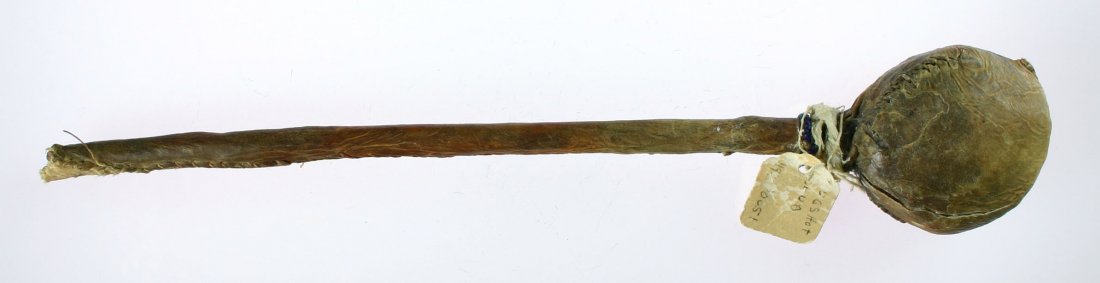 10 1/2" Club: Rawhide wrapped head and handle with beads. May be a small child's example. Reservation period. Ex - Theodore Kouba Collection