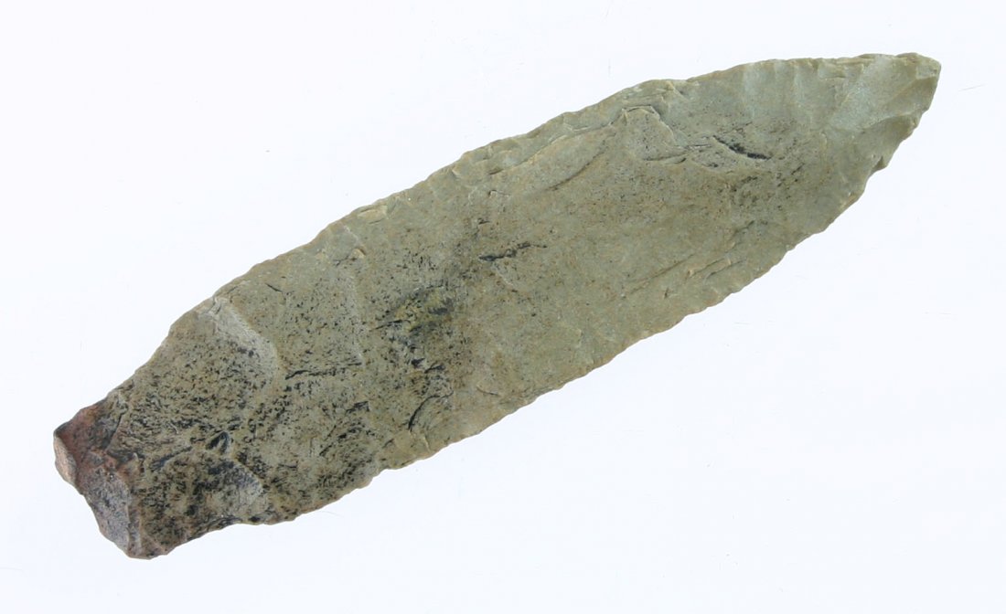 3 1/2" Elk River: Classic Tennessee type. Dover Chert with nice creek silt staining. Thin, long, well made, sharp tip, and all there. Ex- Bingham Collection.