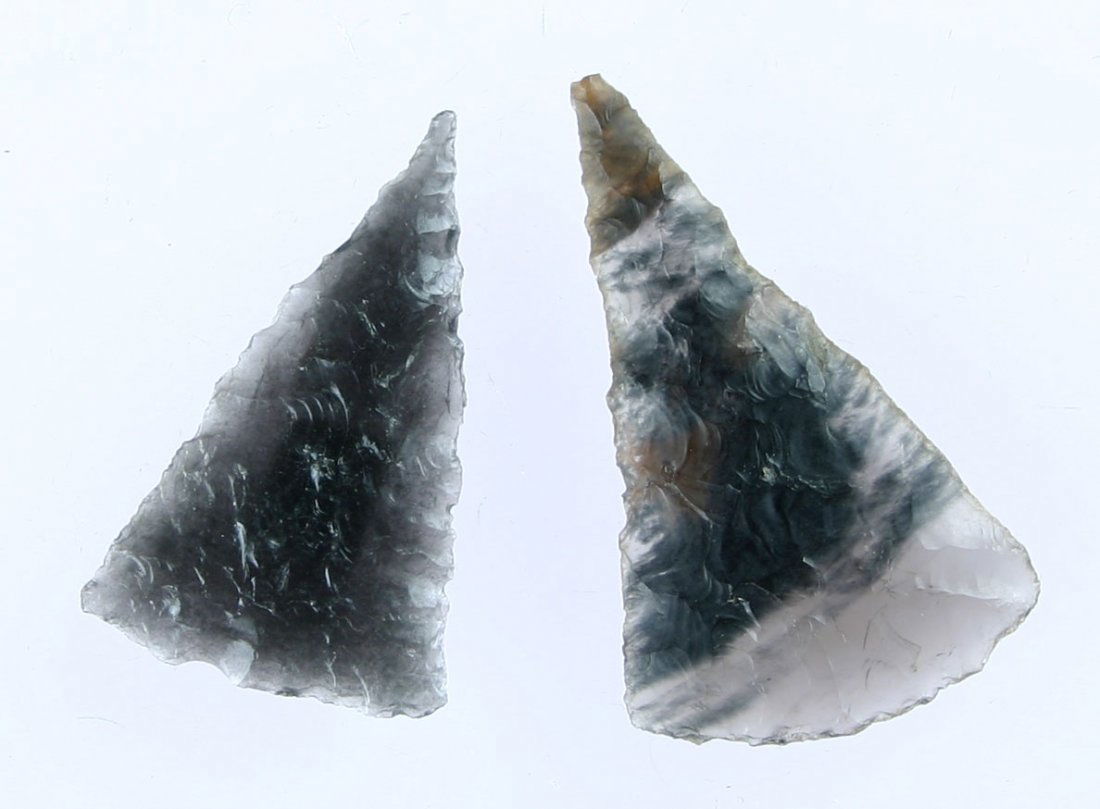 Pair of Cottonwood Triangles: Tri-Flow Obsidian and Smoky Obsidian examples from Northern California. Longest measures 1 5/8".