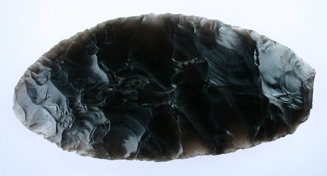 11 1/8" Clovis Biface Knife - Jackson COA: Clovis Culture 'Ultrathin' Biface in banded Obsidian from Washington State. Featured in 2013 GIRS Calendar in April. Extremely rare example and MASSIVE at 5 1/4" Wide!