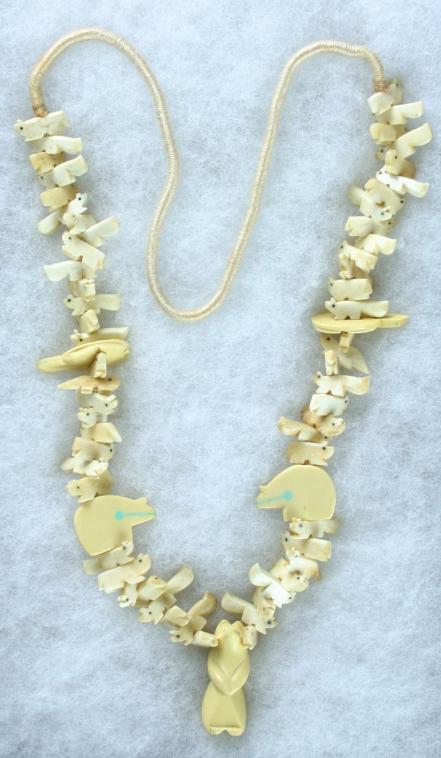 30" Navajo Stacked Animal Fetish Necklace with Bea: Nice necklace of undetermined age with all pieces carved from bone or antler. American Southwest. Formerly of the Theodore Kouba Collection.