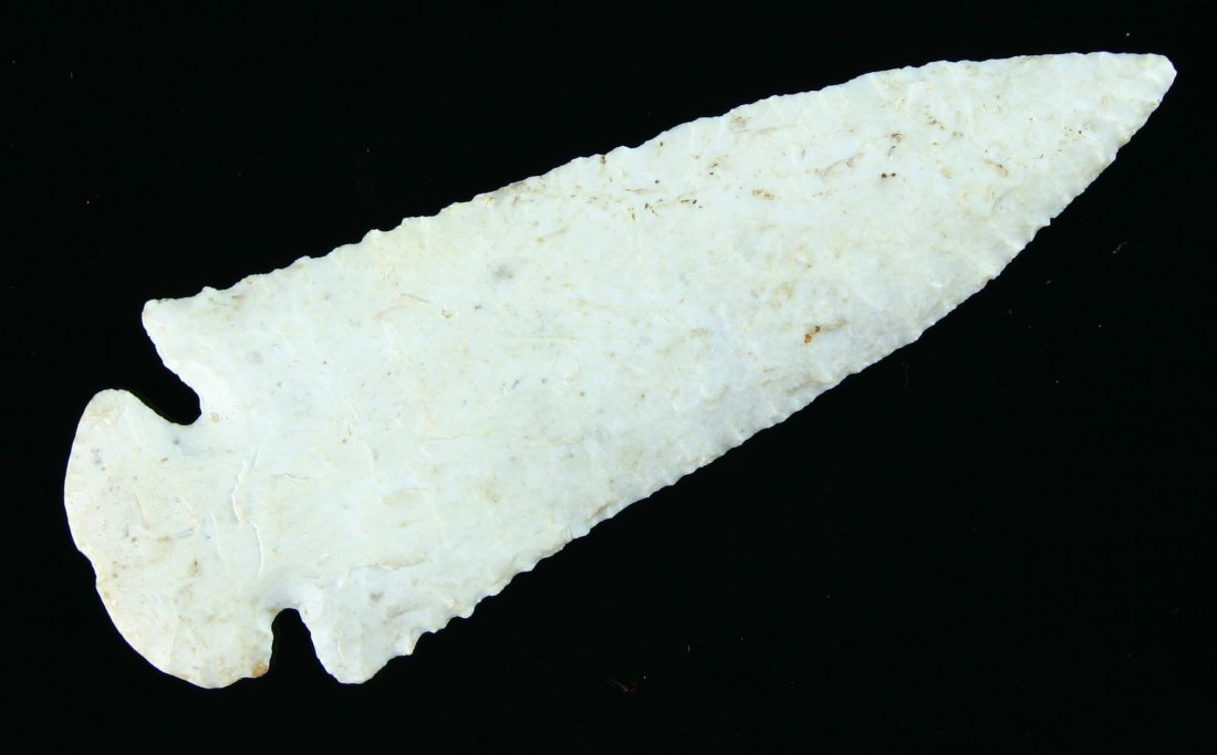 Outstanding 4 1/4" Dovetail - Ex- John Berner: Thin and superb with remarkable flaking. Glossy white flint from Illinois. Ex- John Berner of American Antiquities, Inc.