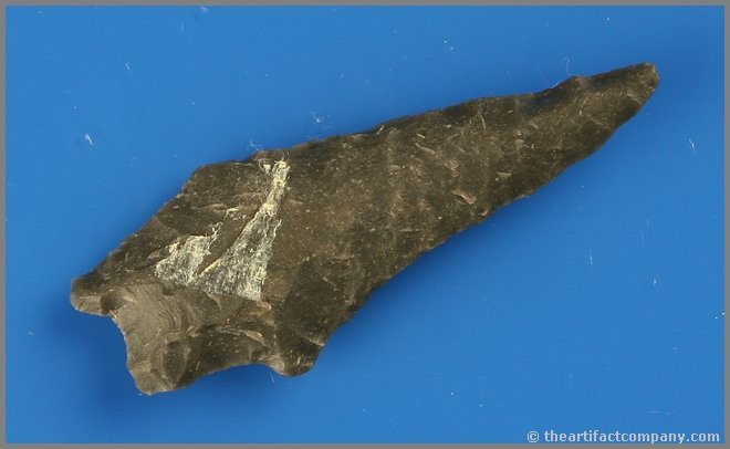 2 3/4" Windust-Hatwai: Obsidian. Found by Reg Seely and The Beaushane Family between 1940-1971 in Lake Co., Oregon. Glue on reverse could easily be removed.