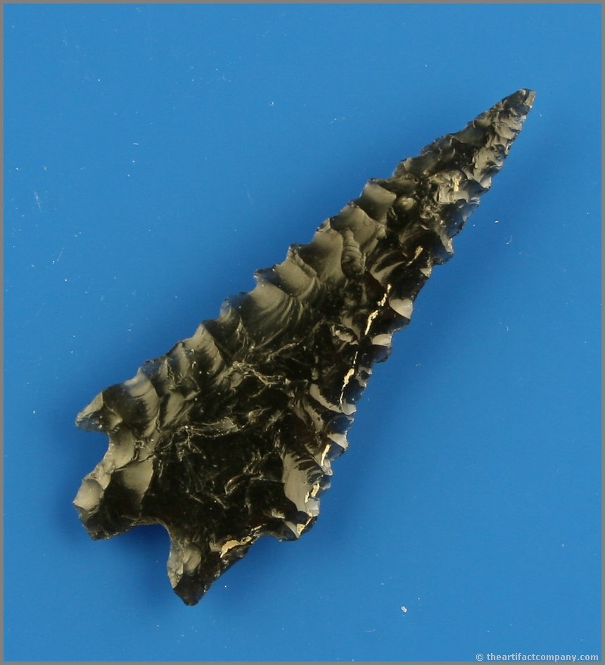 2 1/8" Pinto Basin: Glossy Jet Black Obsidian with nice translucency. Great serrations and long extended needle tip. Ex- Reg Seely Collection. Lake Co., Oregon.