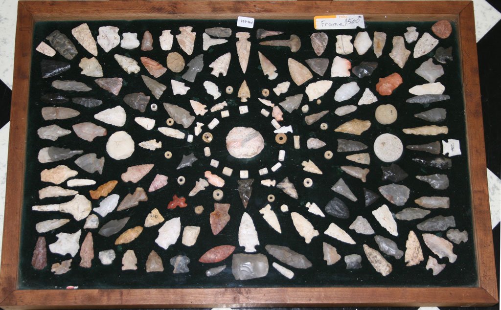 Collection of over 150 Indian Arrowheads, Drills, and B: Lifelong collection of over 150 arrowheads, beads, drills, ect. From a Greene Co., Illinois collector. Loaded with exceptional pieces. Biggest piece measures 2 1/2". Frame not included.
