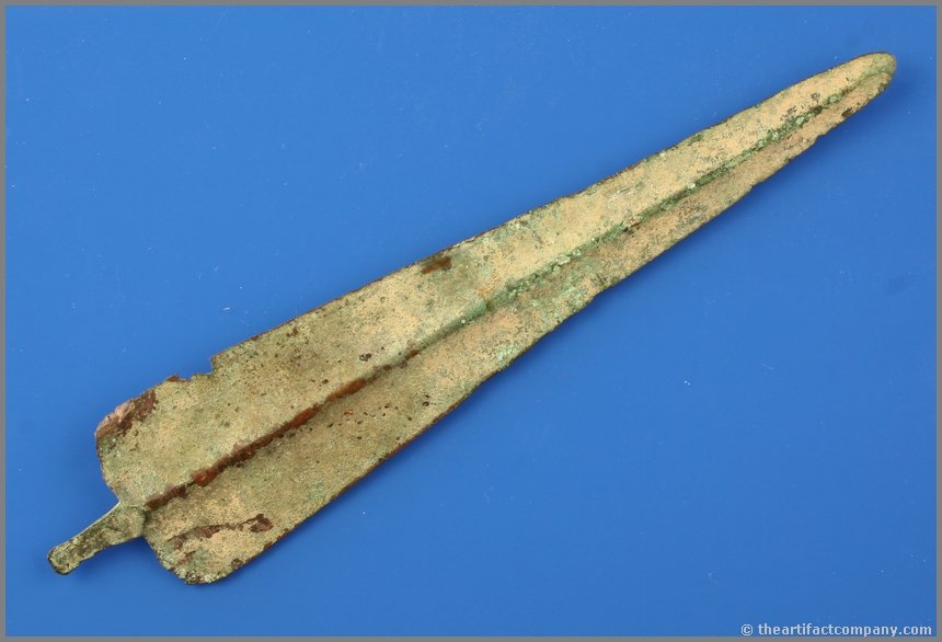 8 1/4" Luristanian Bronze Spear: Superb example. Bronze is completely stable with great verdigris patina. Less than 1/4" thick hand hammered to a beautiful and distinct median ridge on both sides with a short squared rat-tail type st