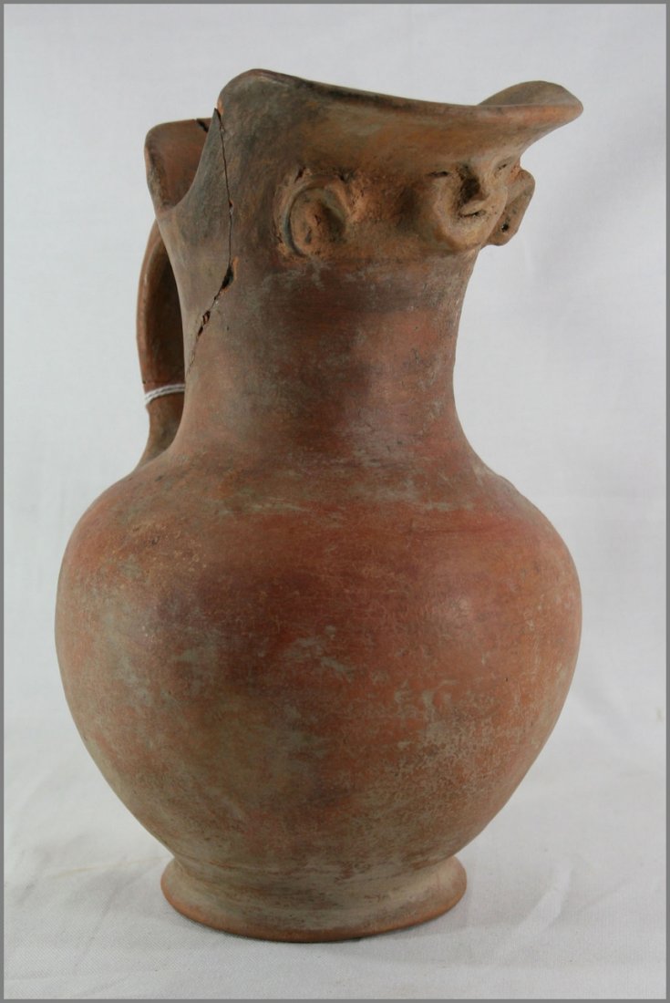 8 1/4" Redware Pitcher - Jackson COA: Nice big example. Beautiful Terra Cotta pitcher from Peru. Nice redware finish. Ex- Dr. E.F. Simpson Collection.