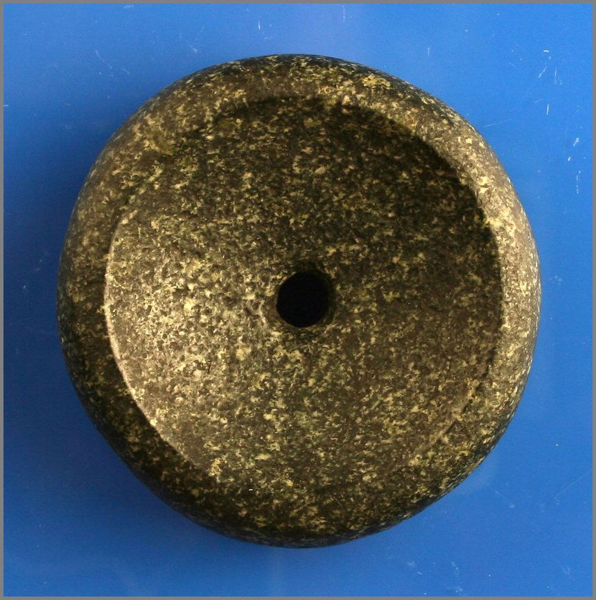 2 1/2" Perforated Cahokia Style Discoidal - Putty COA: Virtually perfect example in speckled black and greeen granite. Highly polished over its entirety. Found in Pope Co., Illinois. Ex- Brandon Vanderver. Putty G-9 COA.