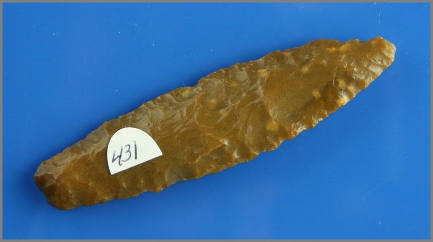 3 9/16" Angostura - Baker G-8.5 COA: Great trans-Paleo form. High quality glossy and semi-translucent root beer colored creek stained Edwards Plateau. Found in Guadalupe Co., Texas. Baker G-8.5 COA.