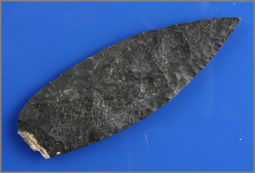 4 3/16" Leaf Blade: Black chert example origin unknown but excellent caliche mineralization present indicating good age. Very thin.