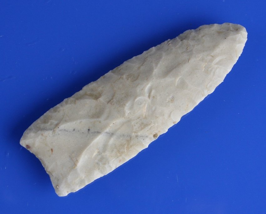 3 7/8" Owl Cave - Rogers COA: Rogers says Owl Cave. We would say Clovis. Great flutes on both sides. Regardless, awesome relic. Really pretty cream/white chert with a distinctive light blue streak running diagonally across the bla