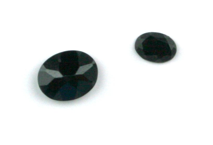 4.5 carats tw Black Spinels: Largest stone 4 carats. Nice pair.