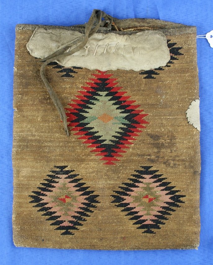 12" Nez Perce Corn Husk Bag: Obviously well loved by its owner with several well done repairs. Ex-Irwin, EK Petrie Collections