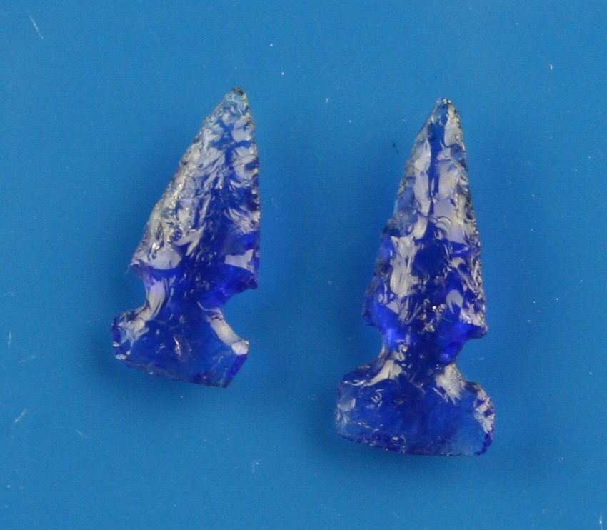Pair of Blue Glass Birdpoints - Ted Orcutt: Super pretty blue glass - maybe insulator glass made by Ted Orcutt at turn of the century (1900). Formerly of the CLP Museum in Woodland, California.
