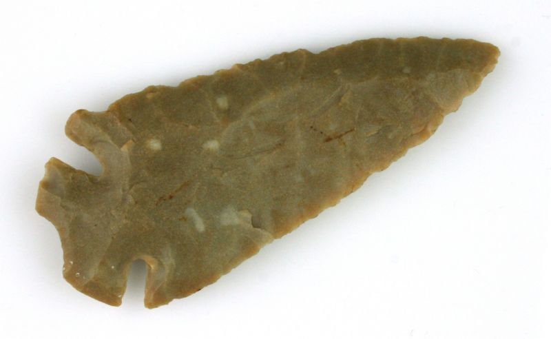 3 11/16" Dovetail - Jackson COA: Pretty well patinated Carter Cave flint with great form and serrations. Found in Ohio. Ex- Joe Macik Collection.