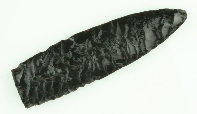 4" Obsidian Fragment: Part of a much larger transverse flaked Obsidian knife form. Old writing says - Texas 1960. Appears to have age but edges are strangely dulled. As such, we are selling as Decorative Only. Ex- Ted Koub