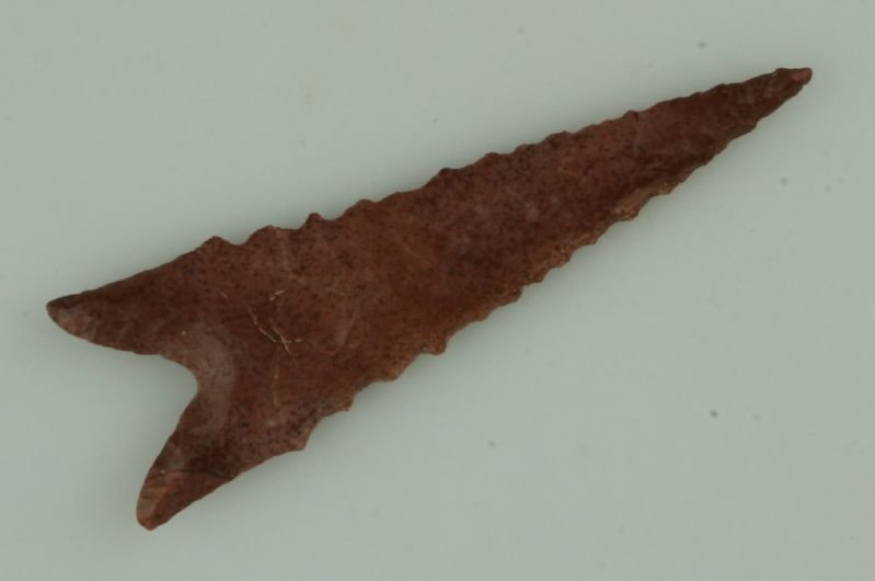 REPRO - 3 1/16" Dalton: Beautiful almost solid red Strawberry Chert. Missouri type and material. Extremely well executed aged 'reproduction' in our opinion.