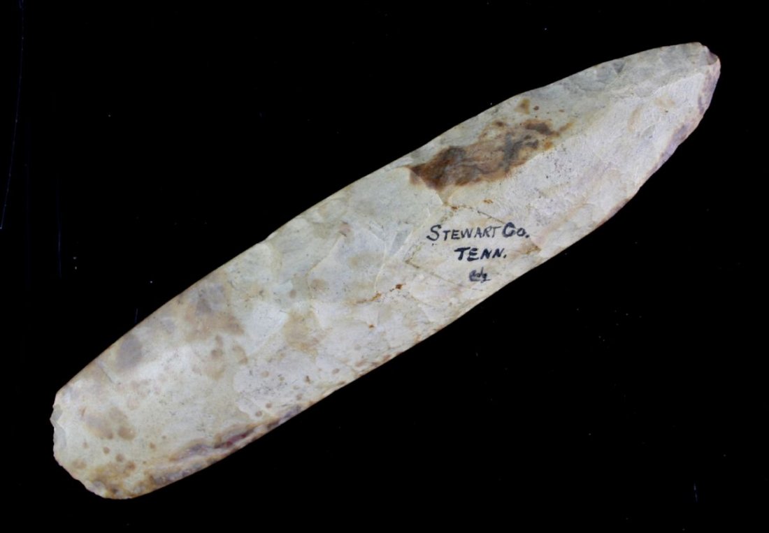 7 13/16" Polished Flint Adze - Jackson COA. Ex Cowan: Super nice example from Stewart Co., Tennessee in Buffalo River Chert. Ex - Cowan Hood Collection. Jackson COA.