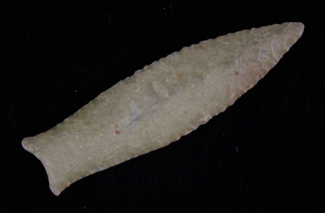 3 5/8" Cumberland - Jackson G-10 COA: Thin & superb. Fluted approximately 40% on both sides. Extremely well patinated and mineralized Fort Payne Chert. Dickson Co., Tennessee. Ex- Arthur Smith Collection.