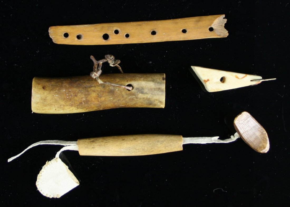 Assortment of Alaskan Inuit Artifacts: Ivory Harpoon, bone toggle, and others in this lot. No sales to California or International Buyers.