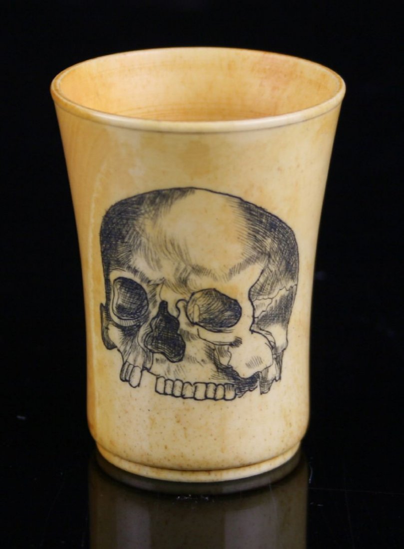 2 9/16" Shot Cup: Nice drinking cup carved from bone with an engraved skull! Really cool. Exact age unknown.