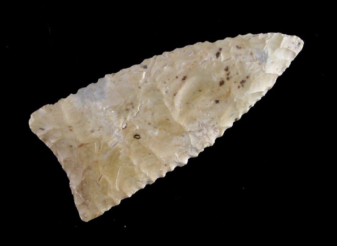 2 5/8" Meserve: Serrated example in cream Edwards Plateau Chert. J.T. Collier Collection - Purchased in 1967 - Polk County, Texas Ex - Russell Long Collection T113/1368
