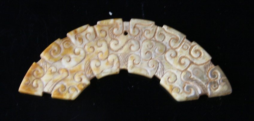 2 5/8" Chinese Han Dynasty Pendant: Intricate carving in the classic style. Drilled for suspension. Beautiful calcified material. Old Pennsylvania Collection.
