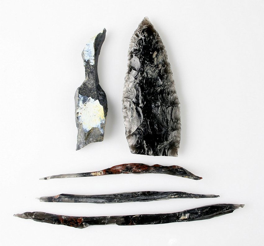 5 nice Obsidian Artifacts: 4 mahogany obsidian gravers and a broken blade. Specific origin not reported although we have seen the gravers sometimes listed as Mexican in origin.