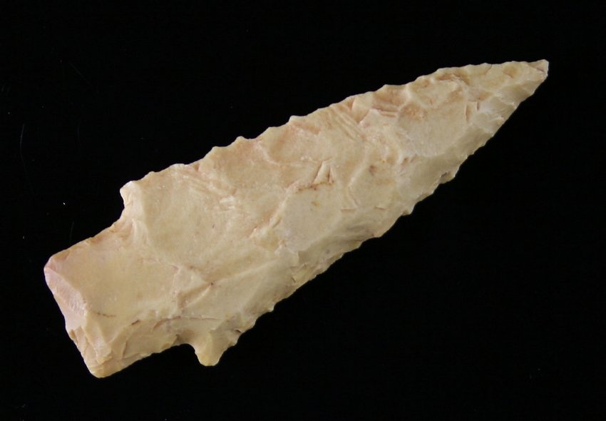 2 3/16" Darl Stemmed: Yellow fossil chert. Found in Brazos County, Texas Ex - Russell Long Collection T128/11