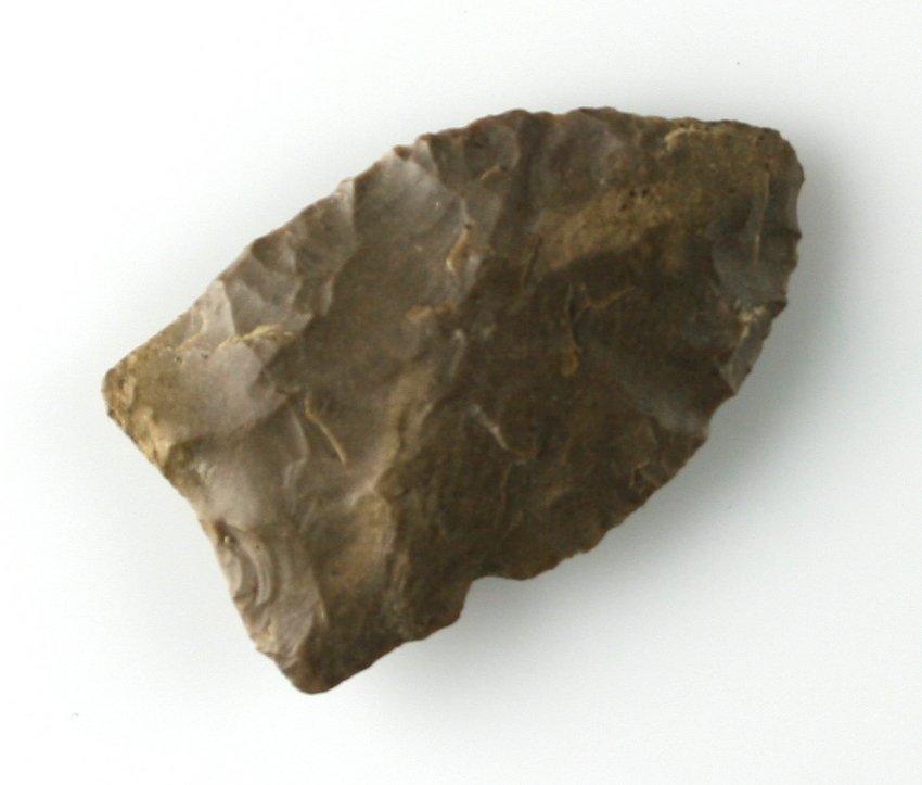 1 5/8" Clovis: Brown Fossil Chert example. Found near the Byron Taber farm 1 mile south of Ada Ex - Russell Long Collection 1415