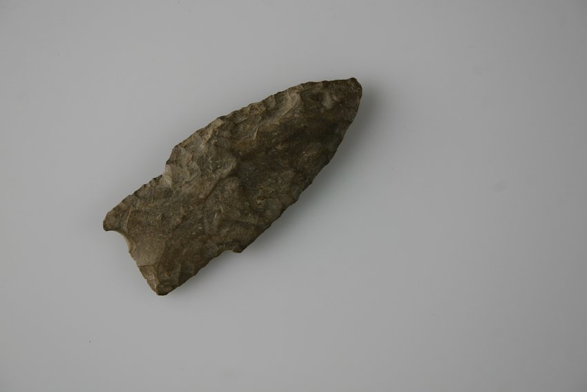 2 1/2" Eastern Stemmed Lance: Brown chert example. Found near Mathewson's Hog Creek in Ada, Ohio Ex - Russell Long Collection 168 or 891