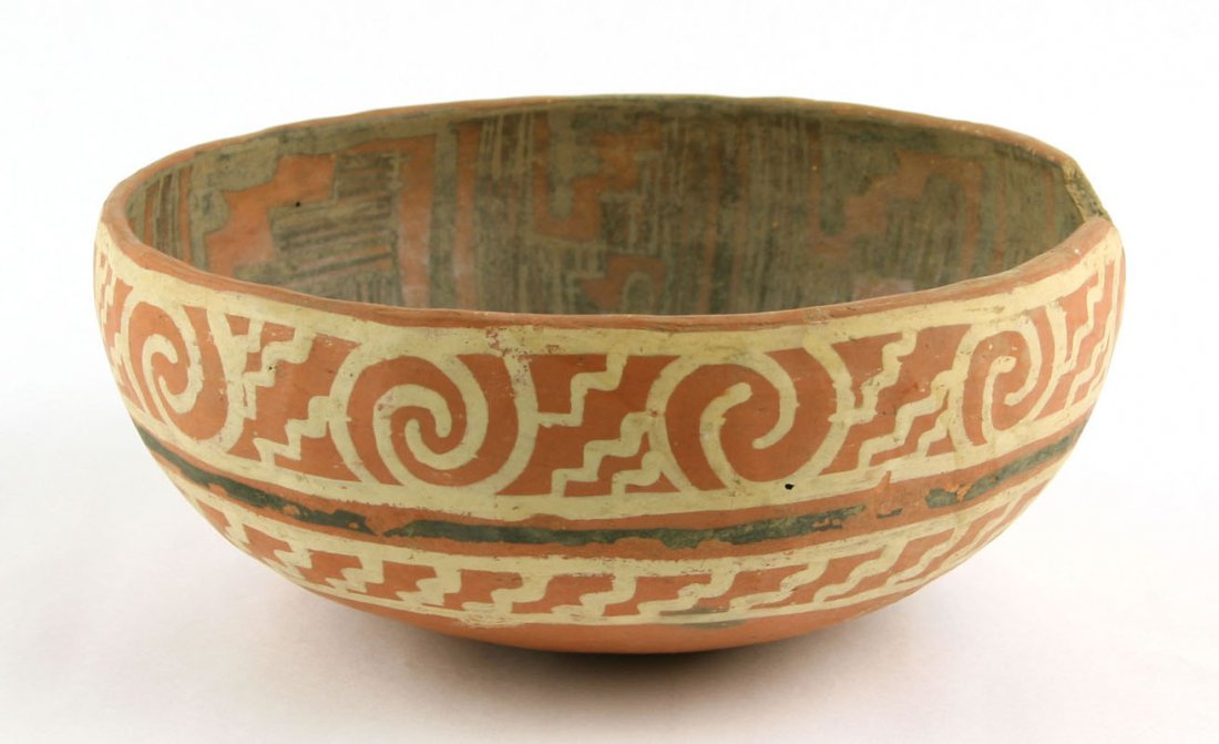 8 1/2" Mogollon White Mountain Bowl: St. Johns Polychrome example from Arizona. Nearly intact with a chip along one rim. 1150-1300AD. Solid, no repairs.