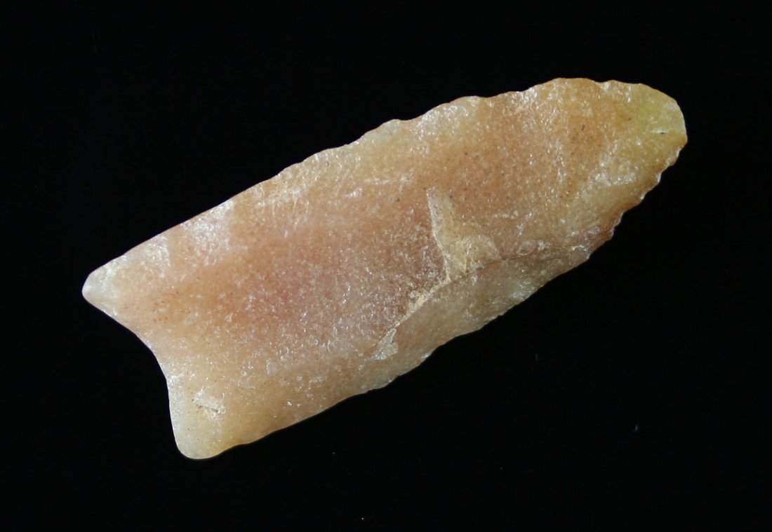 2" Hixton Clovis - Bennett COA: Highly translucent and gorgeous. Long 60% flute on one side and nominally fluted on the other. Found in Wisconsin. Ex- Burke Collection. Bennett COA.
