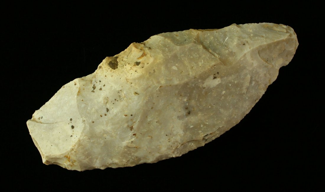 4 3/16" Scraper: Lightly flaked along one edge with excellent mineralization. Kentucky. Boyle Chert. Ex- Art Heaton Collection.