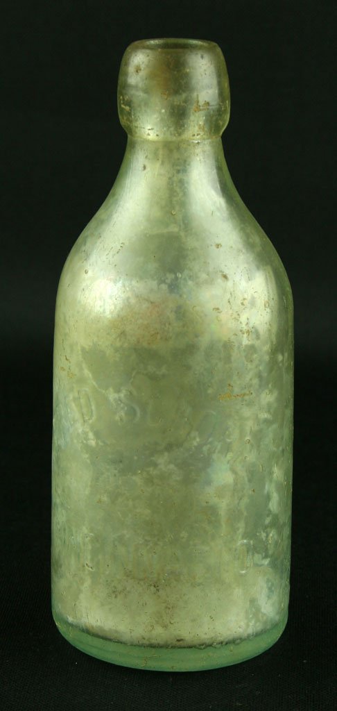 6 13/16" Fred Schorr Soda Bottle: Nice blob-top bottle from Cincinnati, Ohio. With raised lettering and a lion on back side. F.S. on bottom. 1880-1920's.